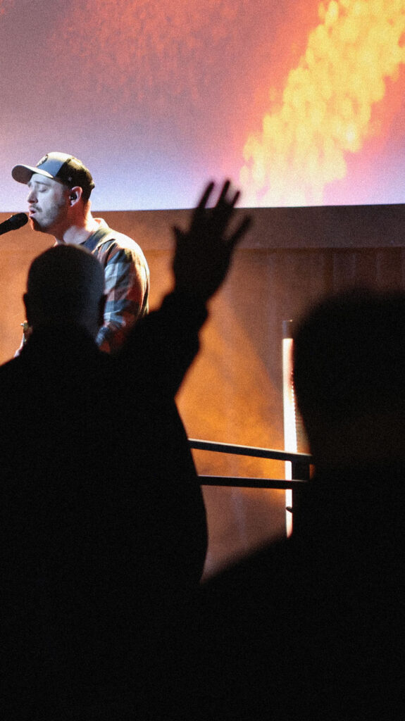 Person worshiping at Epic Church